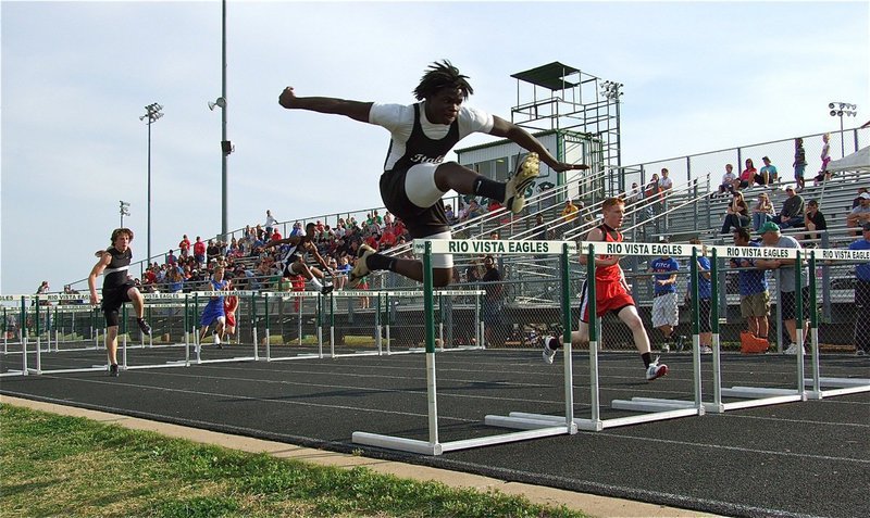 Image: Italy sophomore, Raheem Walker, proves “I” can fly — Italy sophomore, Raheem Walker, finishes in 1st place during the 100 meter hurdles during the district track meet hosted by Rio Vista High School this past Wednesday. Walker finished at the top of the pack in all four events in which he competed.