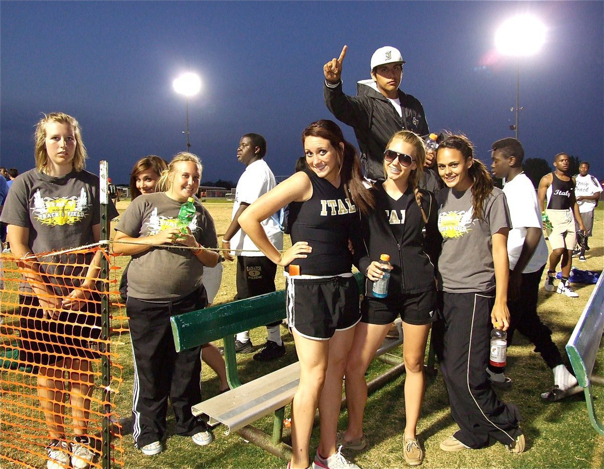 Image: Proud crowd — Imke Klindworth, Kaytlyn Bales, Drenda Burk, Adrian Reed, Breyanna Beets, Sierra Harris, Anna Viers, Paul Harris and Omar Estrada at top, are proud to be representing Italy at the district track meet in Rio Vista.