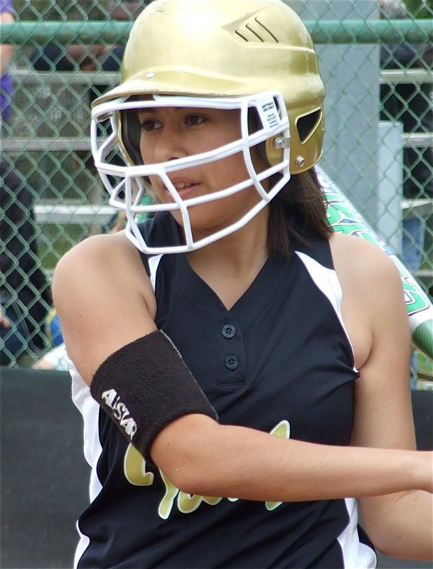 Image: Alma warms up — Alma Suaste gets ready to swat the ball.