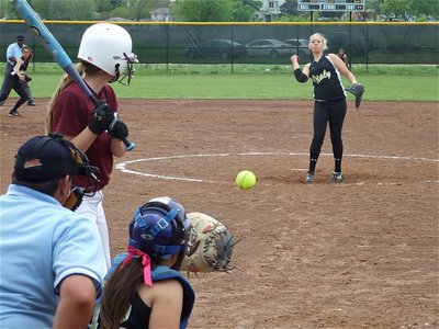Image: Sister to Sister — Megan Richards pitches a strike to her younger sister, and catcher, Alyssa Richards.