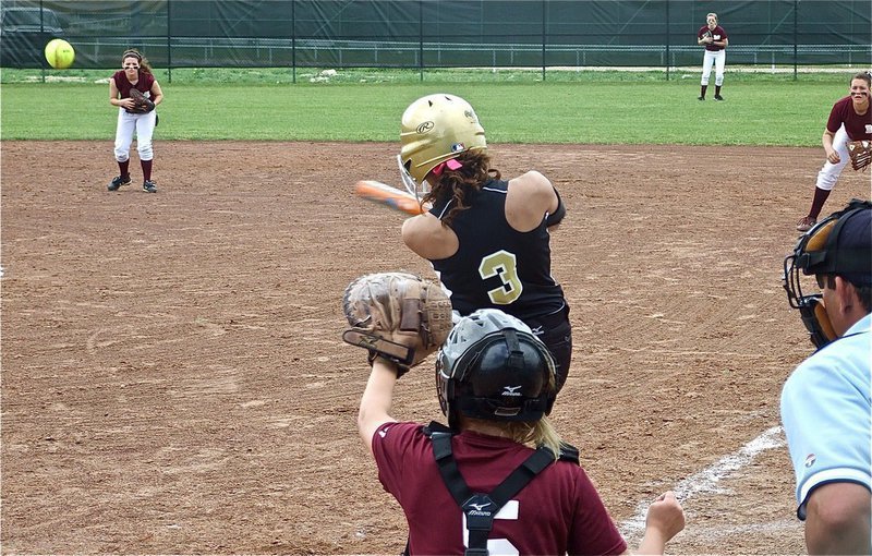 Image: Viers drives the ball — Anna Viers drives a single past Mildred’s shortstop.