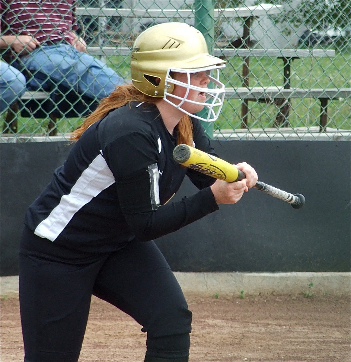 Image: Katie shows bunt — Katie Byers threatens to bunt and eventually gets walked.