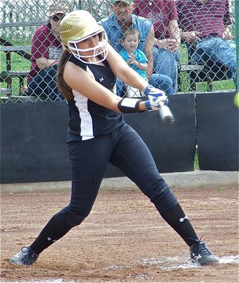 Image: Solid contact — Alyssa Richards cranks one past the Mildred infielders.