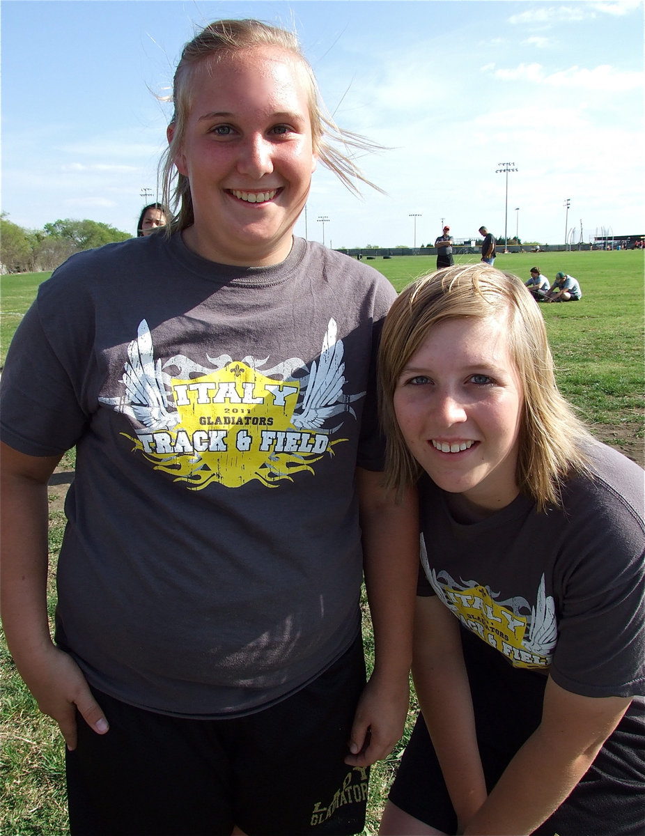 Image: Drenda and Imke — The discus would not be an event without Drenda Burk’s participation as she poses for a picture with track teammate, Imke Klindworth. There were no innocent bystanders harmed during Burk’s throw.