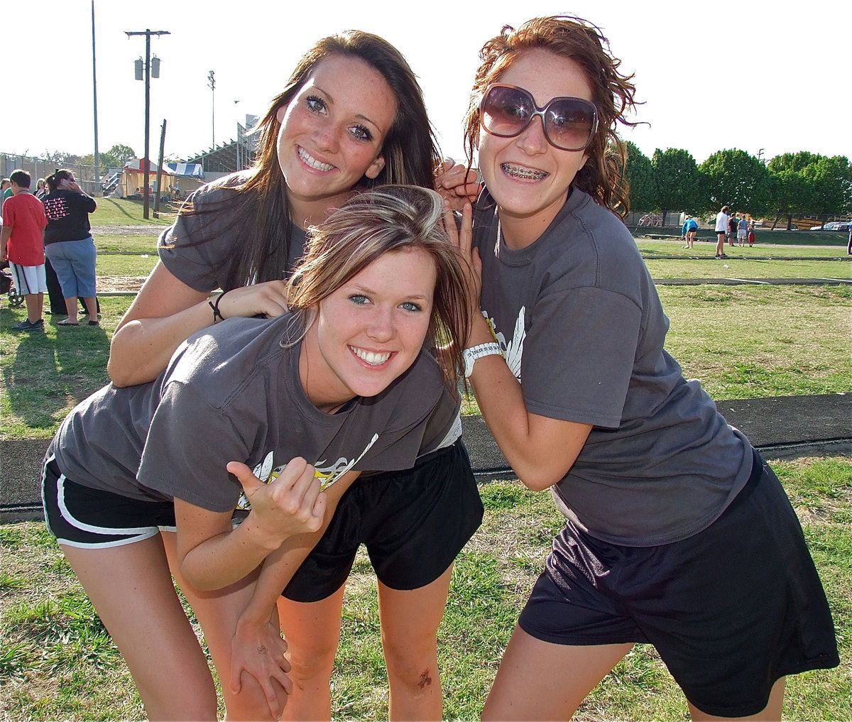 Image: Threemendous — Kaitlyn Rossa, Breyanna Beets and Bailey Bumpus are enjoying competing at the Grandview Zebra Relays.