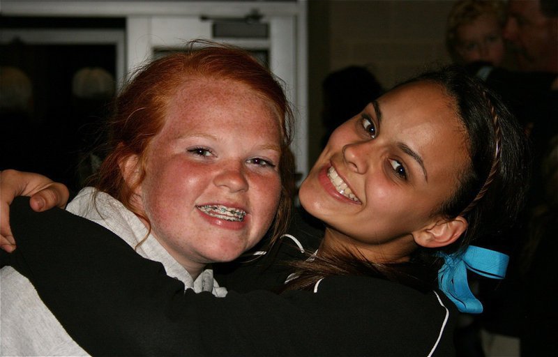 Image: We won, we won! — Katie Byers and Anna Viers celebrate the Gladiators’ playoff win over Mildred.