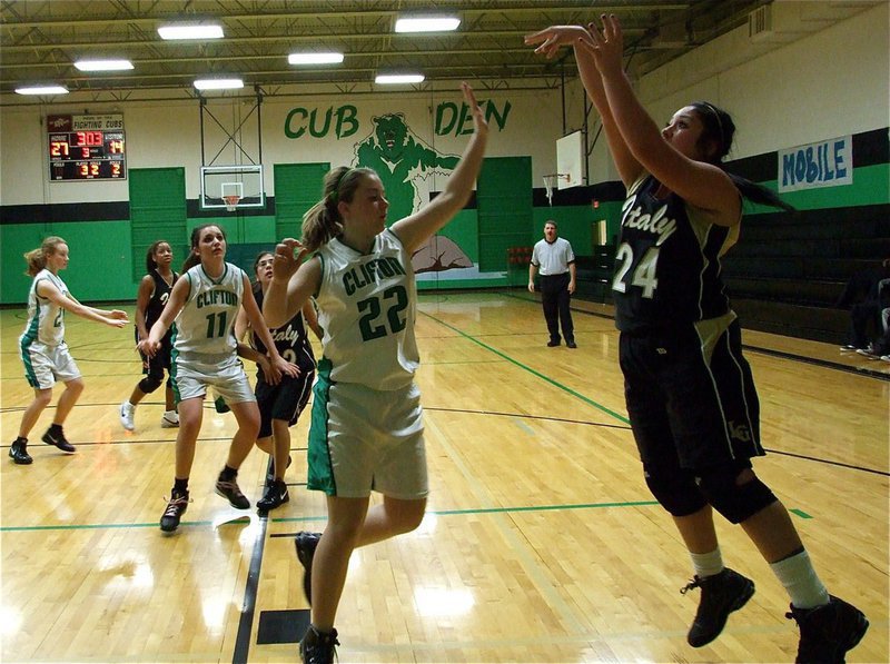 Image: Taking the shot — Italy’s Monserrat Figueroa(24) pulls up for a baseline jumper.