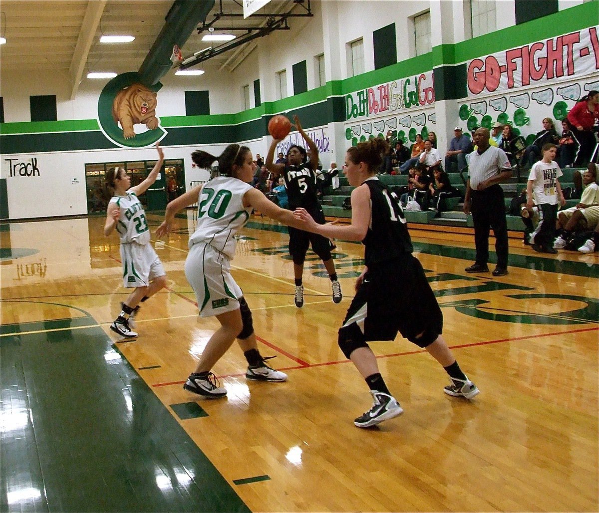 Image: Copeland has range — Jameka Copeland(5) pulls up and swishes a jump shot as teammate Bailey Bumpus(13) scrambles for the rebound.