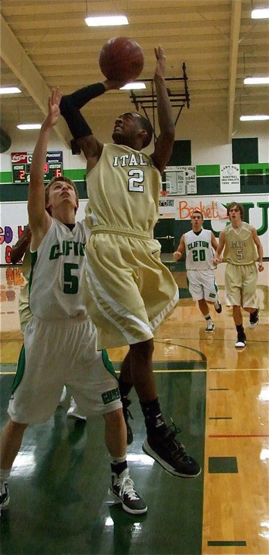 Image: Heath Clemons — If your going to be a bear, be a grizzly! Heath Clemons(2) powers his way up for two-points against the Cubs.