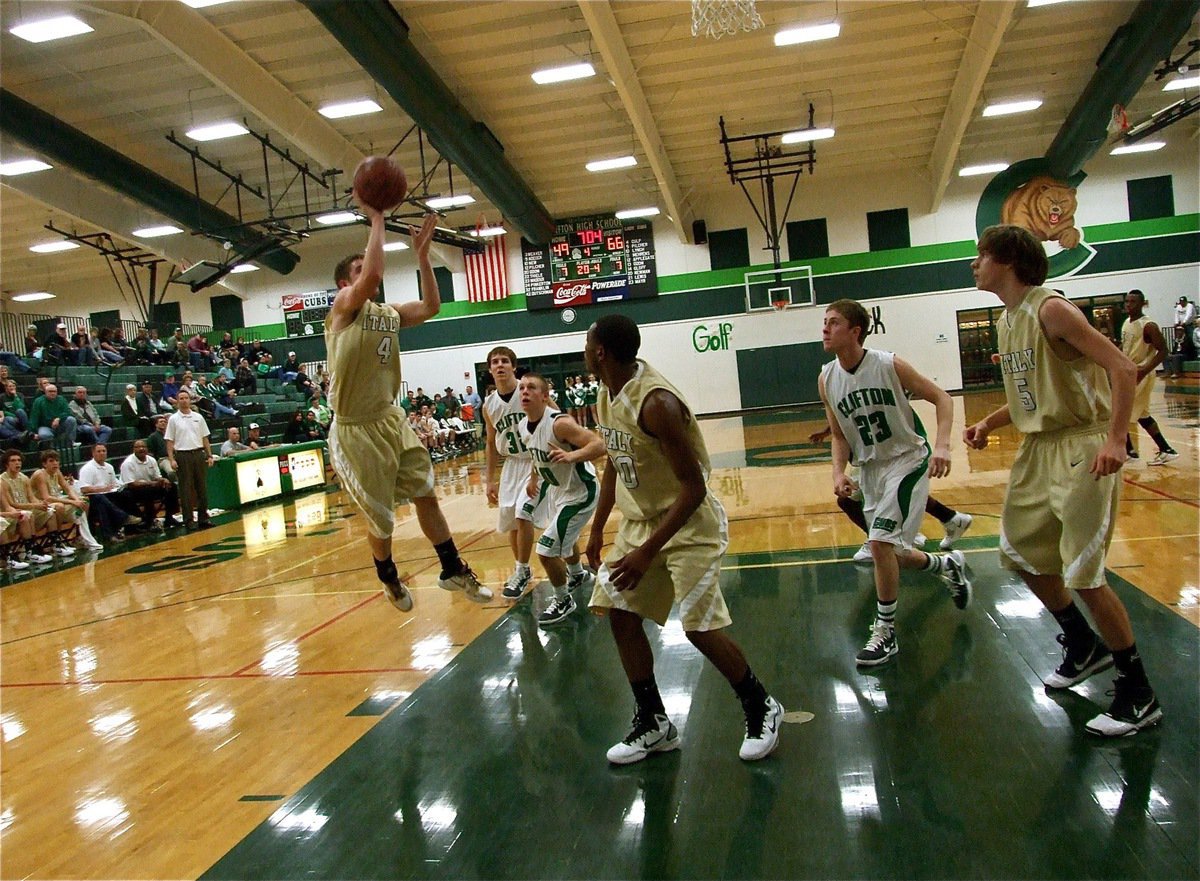 Image: Ashcraftiness — Italy’s Ryan Ashcraft(4) leans in for a score against Clifton with teammates De’Andre Sephus(20) and Colton Campbell(5) in rebounding position.