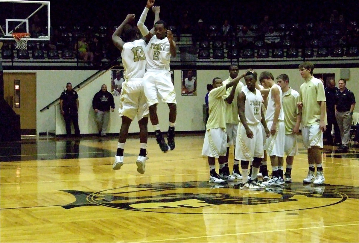 Image: Energizing the crowd — Larry Mayberry(13) and Heath Clemons(2) get energized during Italy’s pre-game introductions.