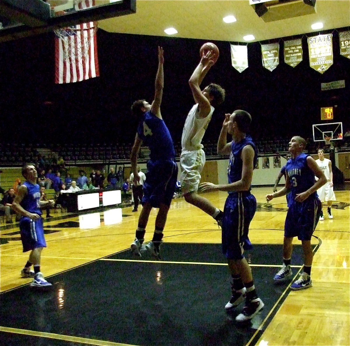 Image: Hopkins scores inside — Italy’s Cole Hopkins(21) out leaps a Wildcat defender and scores in the paint as the Gladiators win easily, 83-50, over Whitney.