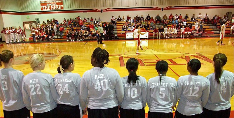 Image: Italy’s Lady Gladiators try to fence in the Axtell Lady Longhorns — The Lady Gladiators sport matching shirts with their nicknames on the back before the start of their game against the Axtell Lady Longhorns.