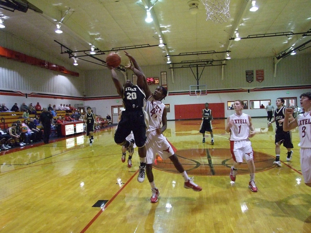 Image: Jalarnce Lewis(20) — Italy J.V. Gladiator Jamal Jalarnce Lewis(20) flies in for two-pints against Axtell’s J.V. team.