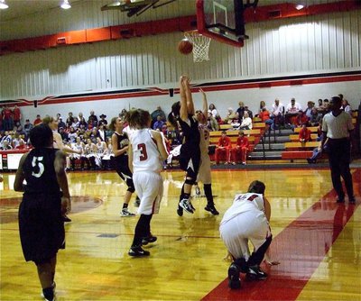 Image: Shelbi comes thru — Lady Gladiator Shelbi Gilley(4) scores two of her seven first-half points against Axtell.