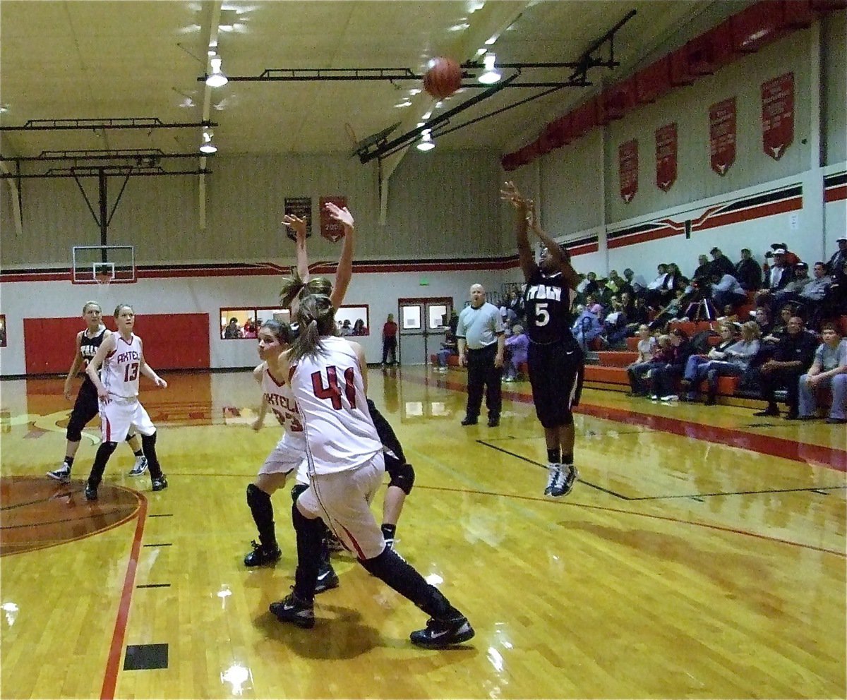 Image: Precision aim — Lady Gladiator Jameka Copeland(5) knocks down a jumper against Axtell.