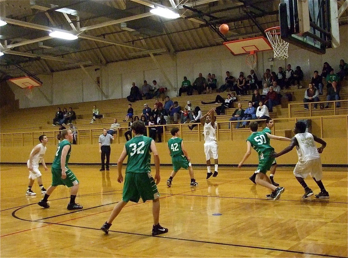 Image: Shoot that! — Italy’s Trevon Robertson(15) tries the three-ball against Clifton during the JV game.