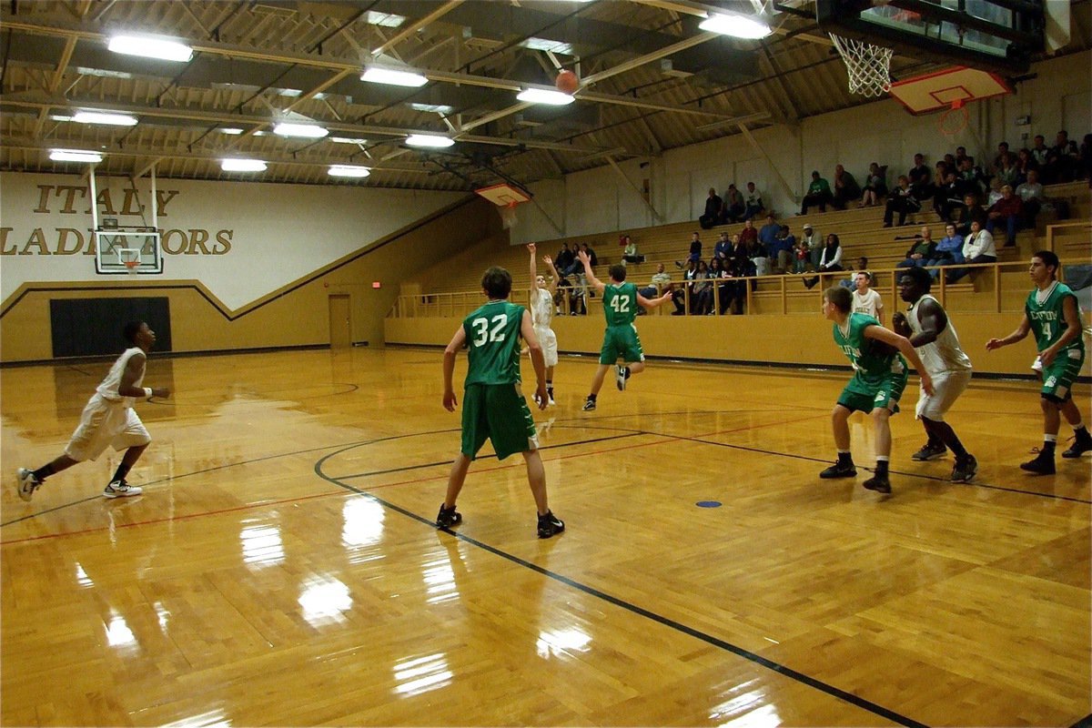 Image: Caden goes crazy — Italy’s Caden Jacinto(2) dials up one of his four three-pointers from long distance.