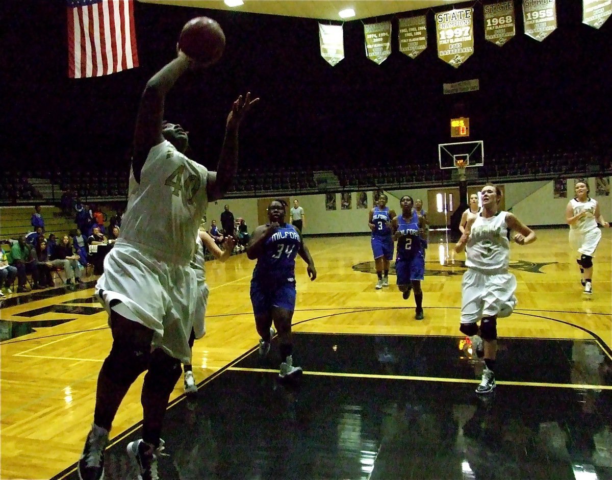 Image: High level of play — Lady Gladiator Jimesha Reed(40) puts in18-points against the Milford Lady Bulldogs to lead all scores.