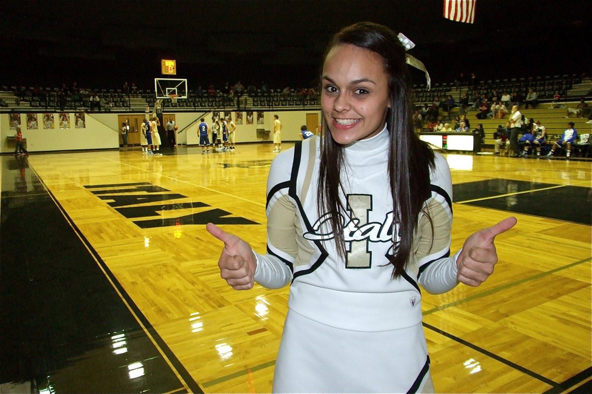 Image: We got this — IHS cheerleader Anna Viers gives the thumbs up sign during the Gladiators versus Frost game.