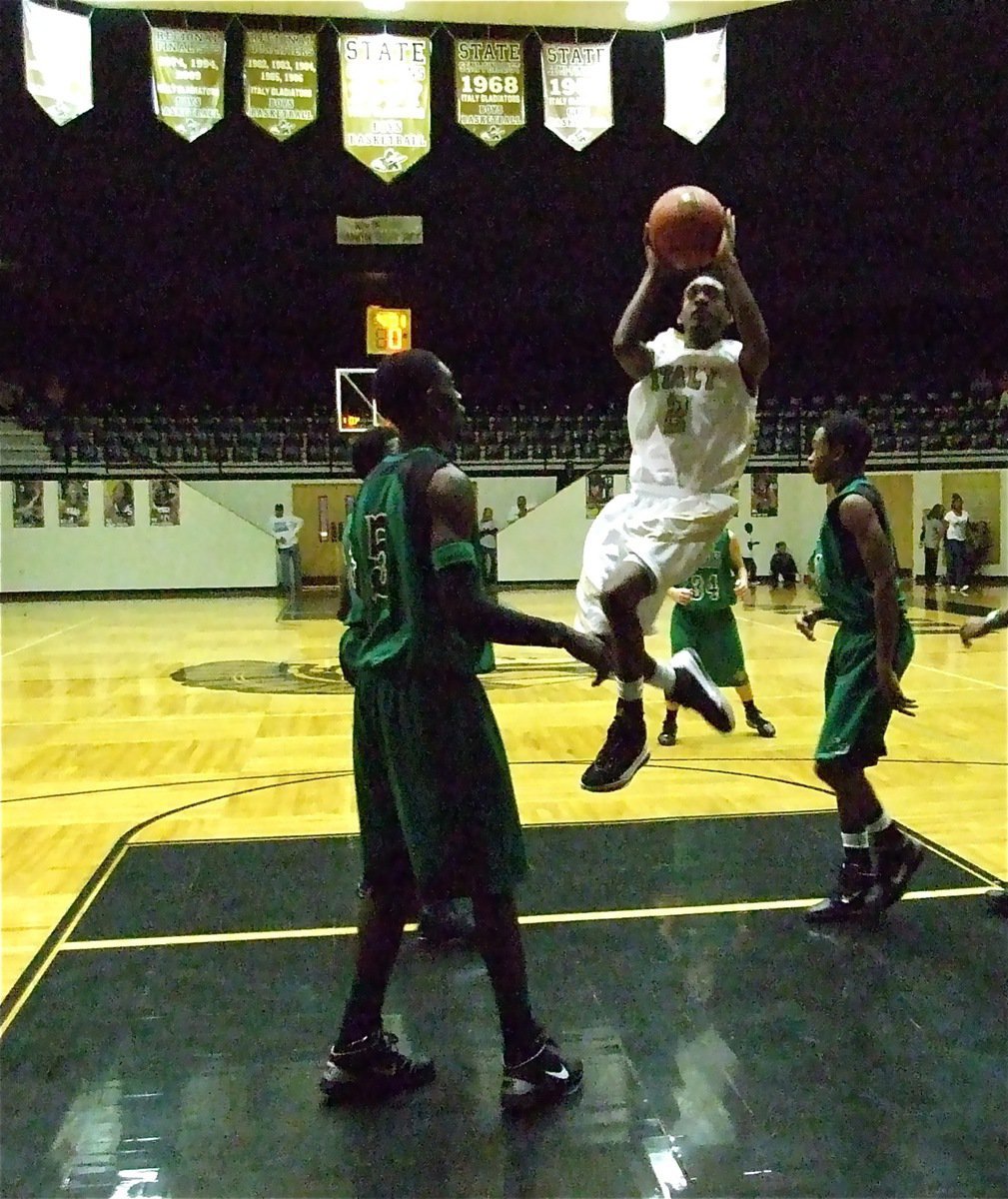 Image: Still attacking — Gladiator Heath Clemons(2) continues to put pressure on Kerens during the tournament championship game.