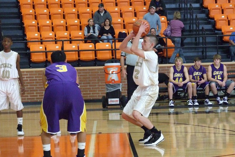 Image: Itson at the line — Bubba Itson(12) takes aim at a free-throw against Godley during the Ferris Tournament.