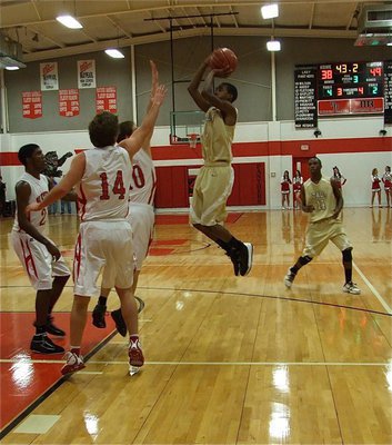 Image: Clemons pulls up — Gladiator Heath Clemons(2) rises for another two-points over Maypearl’s defense.