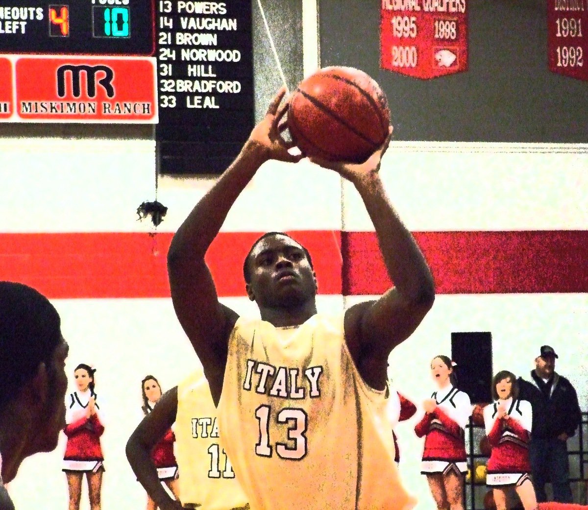 Image: Big shot — Gladiator center Larry Mayberry(13) puts in a free-throw against Maypearl.