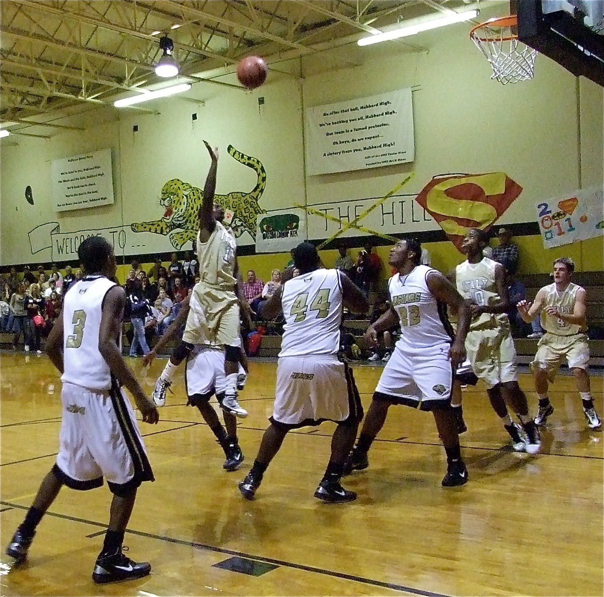 Image: Jasenio Anderson(11) shoots up and over Hubbard’s defense — Jasenio Anderson(11) maneuvers into the lane for a basket during the Italy Gladiators season opener against the Hubbard Jaguars.