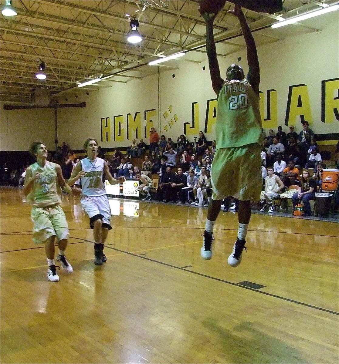 Image: Sephus hustles — De’Andre Sephus(20) rises for the layup to complete a Gladiator fast break.