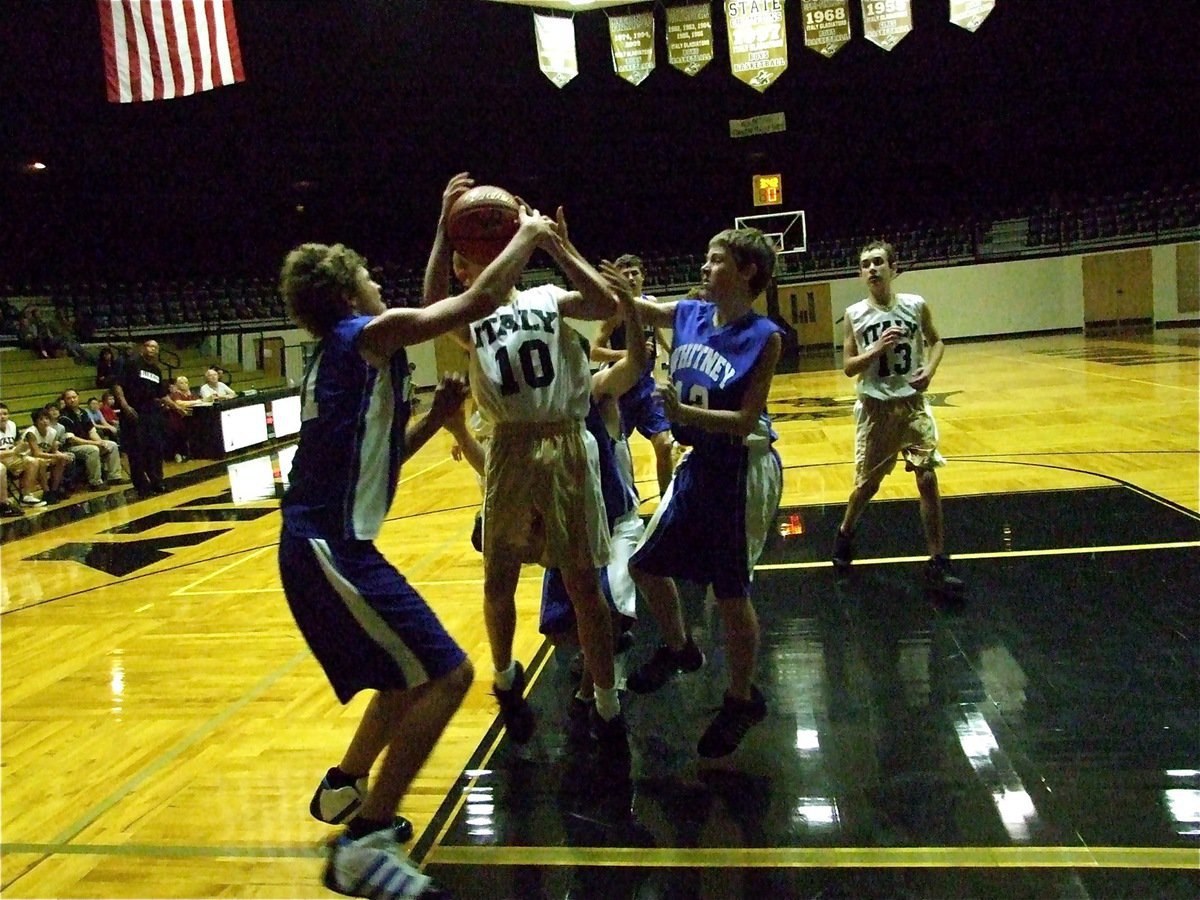 Image: When Wildcats attack — Italy’s Cody Boyd(10) is mauled by a few Whitney Wildcat defenders as he goes up for the shot. Boyd scored 6-points in the game but Whitney won by one, 30-29.