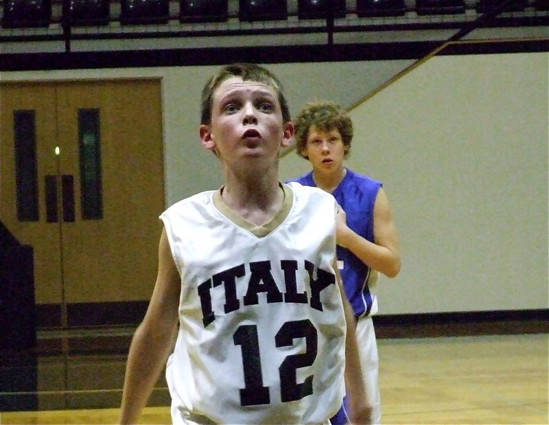 Image: Just a breath away — Italy’s Gold team was just a breath away from a win against Monday night as Ty Windham tries to give his basketball an extra push from the foul line. Whitney rallied late for a 30-29 victory.