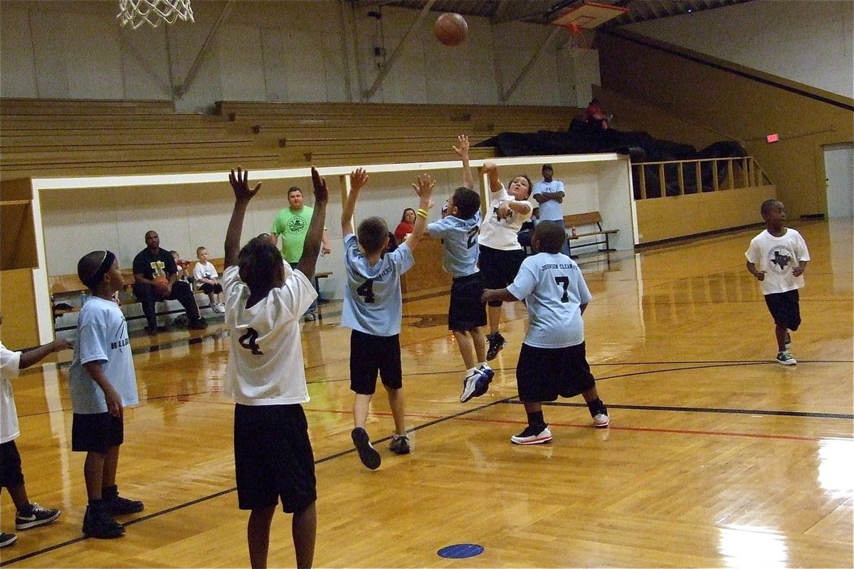 Image: Italy’s Evan Cunningham pulls up for a jump shot over Hillsboro — Against Hillsboro Baby Blue, Italy’s Evan Cunningham(13) takes a shot from the right elbow with Jahiyah Hall(4) in rebounding position during K-2nd co-ed basketball action inside the old Italy gym on Saturday.