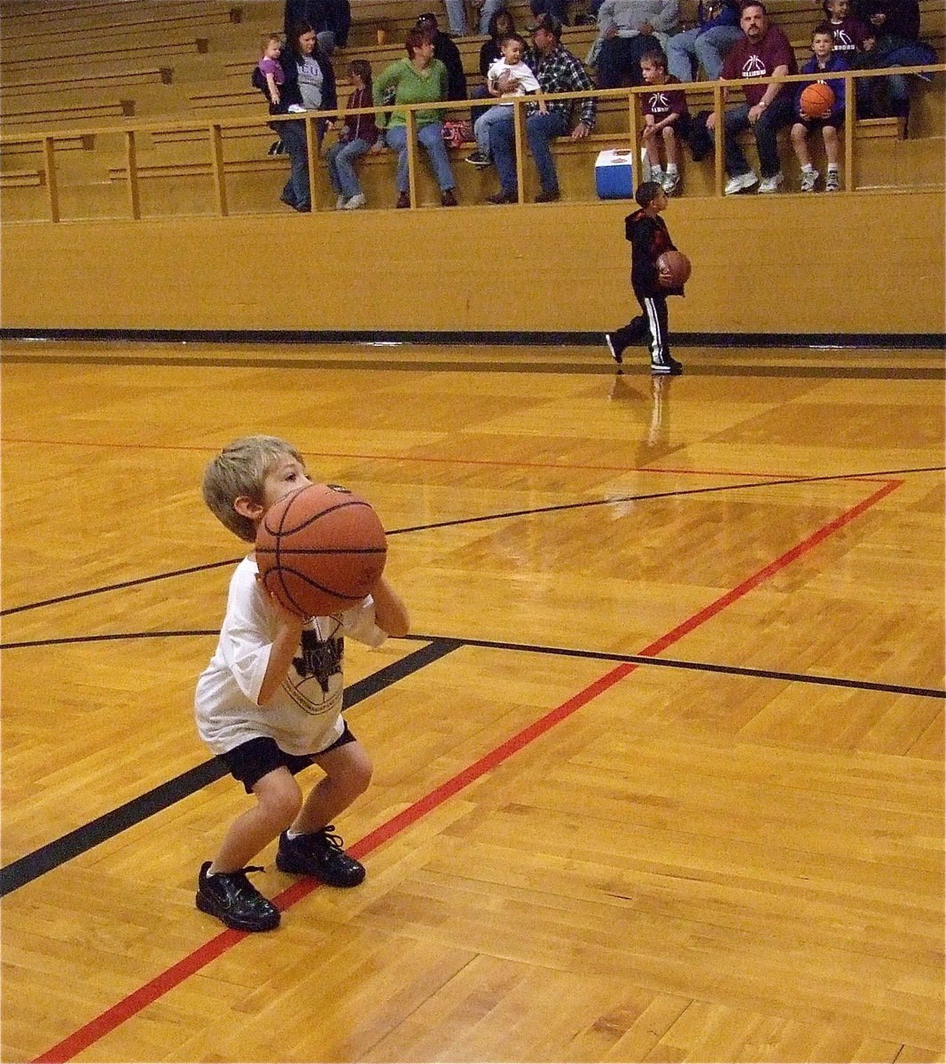 Image: Believe! — Italy’s Brodie Hugghins(2) takes his pre-game free-throw before his team’s game against Hillsboro Baby Blue.