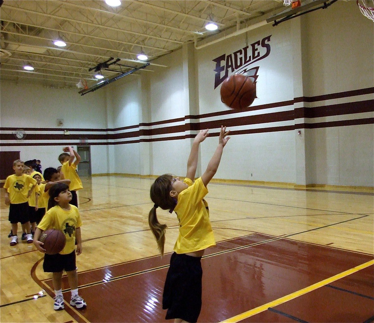 Image: Katie shoots — Katie South practices a layup before her team’s game against Hillsboro