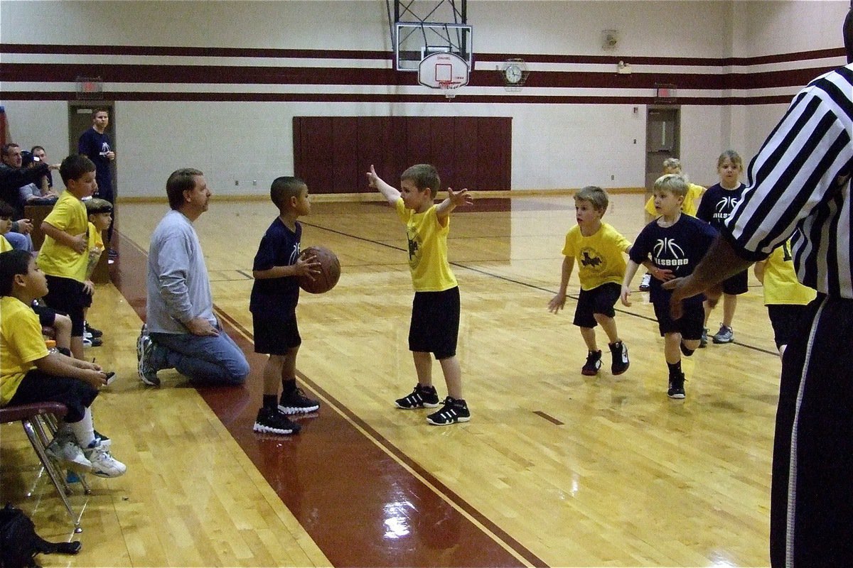 Image: Pressure the ball — Bryce DeBorde and Reese Janek try to detour the inbound pass.