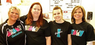 Image: Cool Shirts! — Micki Bland, Michelle Richards, Casandra Jeffords and Darla Wood sport their individually sewn Italy Gladiator shirts that Micki organized as a fund raiser for the IYAA and were on sale at the concession stand.