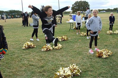 Image: Hang time — IYAA cheerleader, Courtni Bland, leaps for the Gladiators.