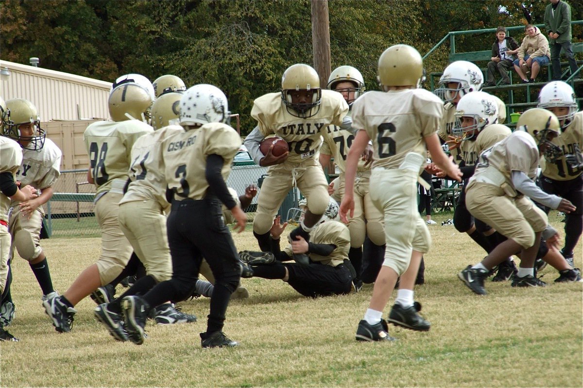 Image: Nipping at our heels — Taron Smith(10) helps Italy’s IYAA B-Team step over the Palmer Bulldogs and into the Superbowl.