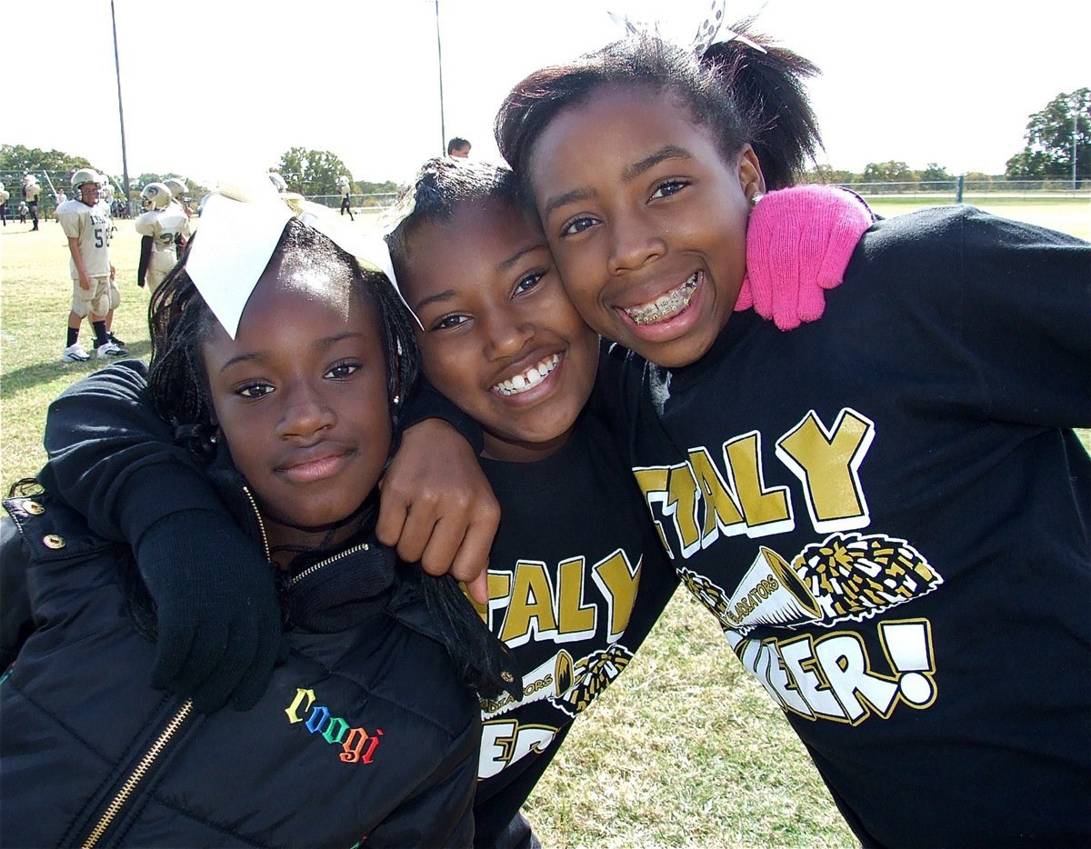 Image: Cheese! — IYAA cheerleaders and football players made a lifetime of memories on Saturday.