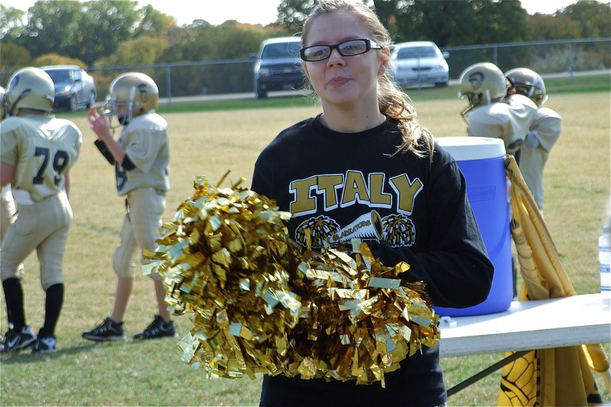 Image: We’re back! — IYAA Cheerleader Brook DeBorde asks the question, “Can you see us now?” The B-Team Gladiators beat Palmer 12-0 in the playoff round for the right to appear in the 2010 NESA Superbowl.