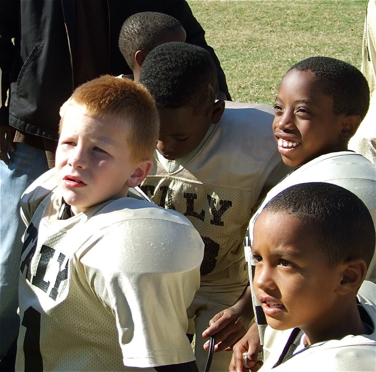 Image: Ready for the game — IYAA C-Team players Ty Cash, Julius Williams, Joe Jackson and Jayvyn “Peanut” Azakytu get their game faces on.