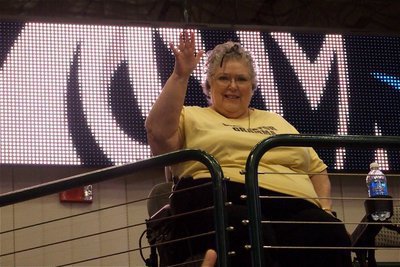 Image: Proud Gramma — Gladiator Gramma Jody Cooley waves from the upper deck of the American Airlines Center down to her grandson Brandon Souder who plays for the Italy Gladiators.