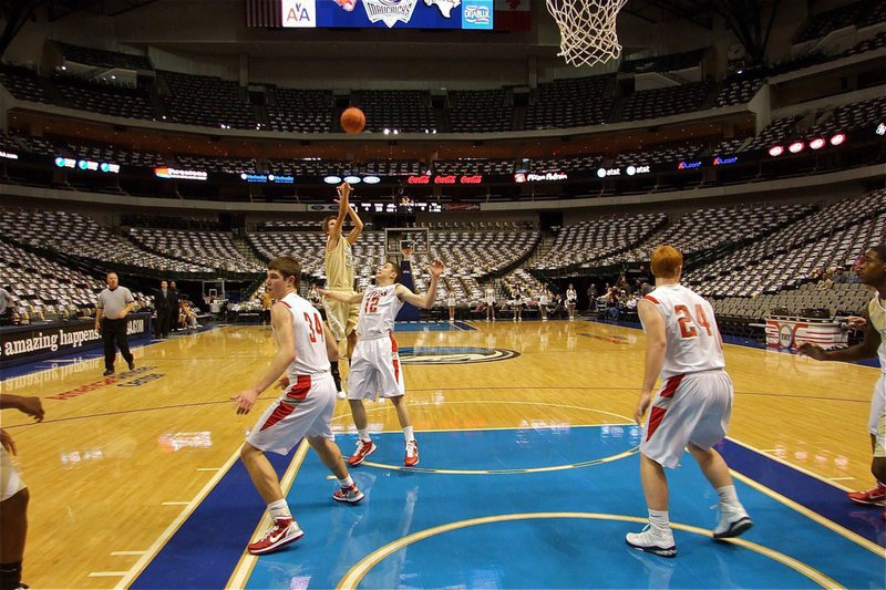 Image: Jase takes a jump shot — Gladiator Jase Holden(3) pulls up for a jumper from the left elbow.