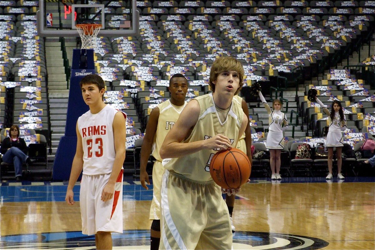 Image: Colton concentrates — Italy’s Colton Campbell(5) exhales before shooting a free-throw at the American Airlines Center in Dallas.