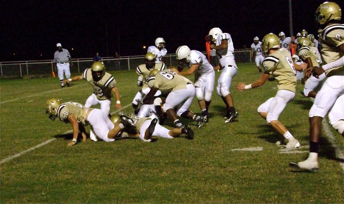 Image: Setting a trap — Bobby Wilson(64), Kyle Jackson(28), Ethan Simon(50), Brandon Souder(63) and Corrin Frazier(25) team up to trap a Cougar.