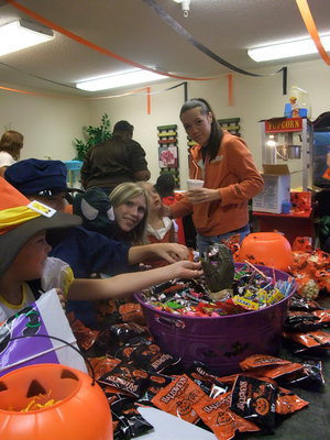 Image: Scary Hand — The Scary hand did not stop these students from getting their treats.