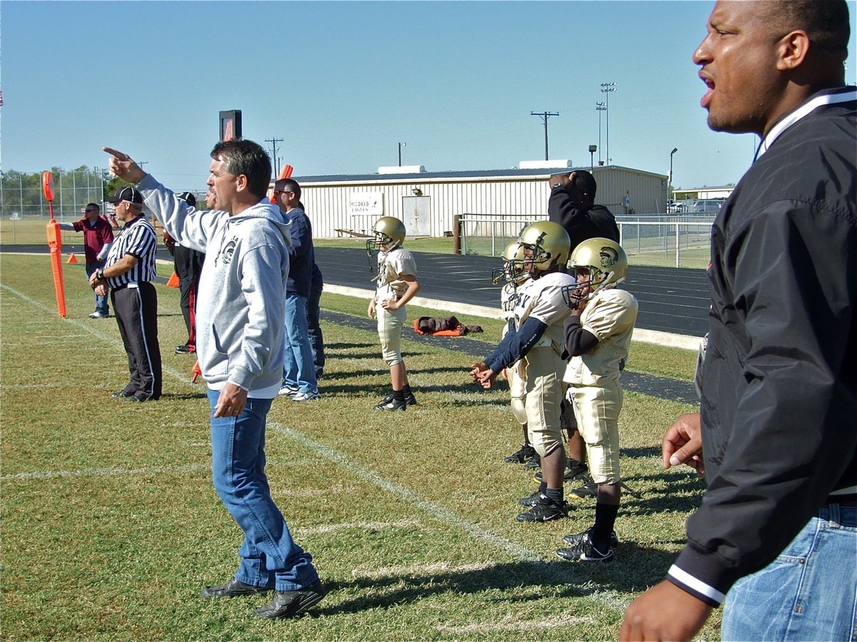 Image: Blitz! — B-Team coaches, Gary Wood and Al Addison, send instructions into the game.