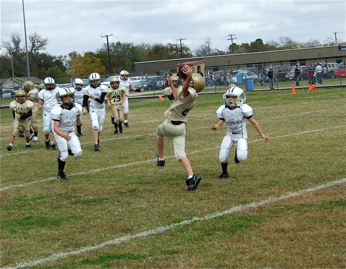 Image: Amazing catch! — Ryder Itson(6) makes an amazing one-handed grab and then breaks a tackle before being brought down after a 40-yard gain in the Superbowl.