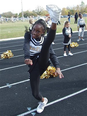 Image: Kicking up the noise — IYAA cheerleaders entertained fans with throughout two Superbowl games on Saturday.